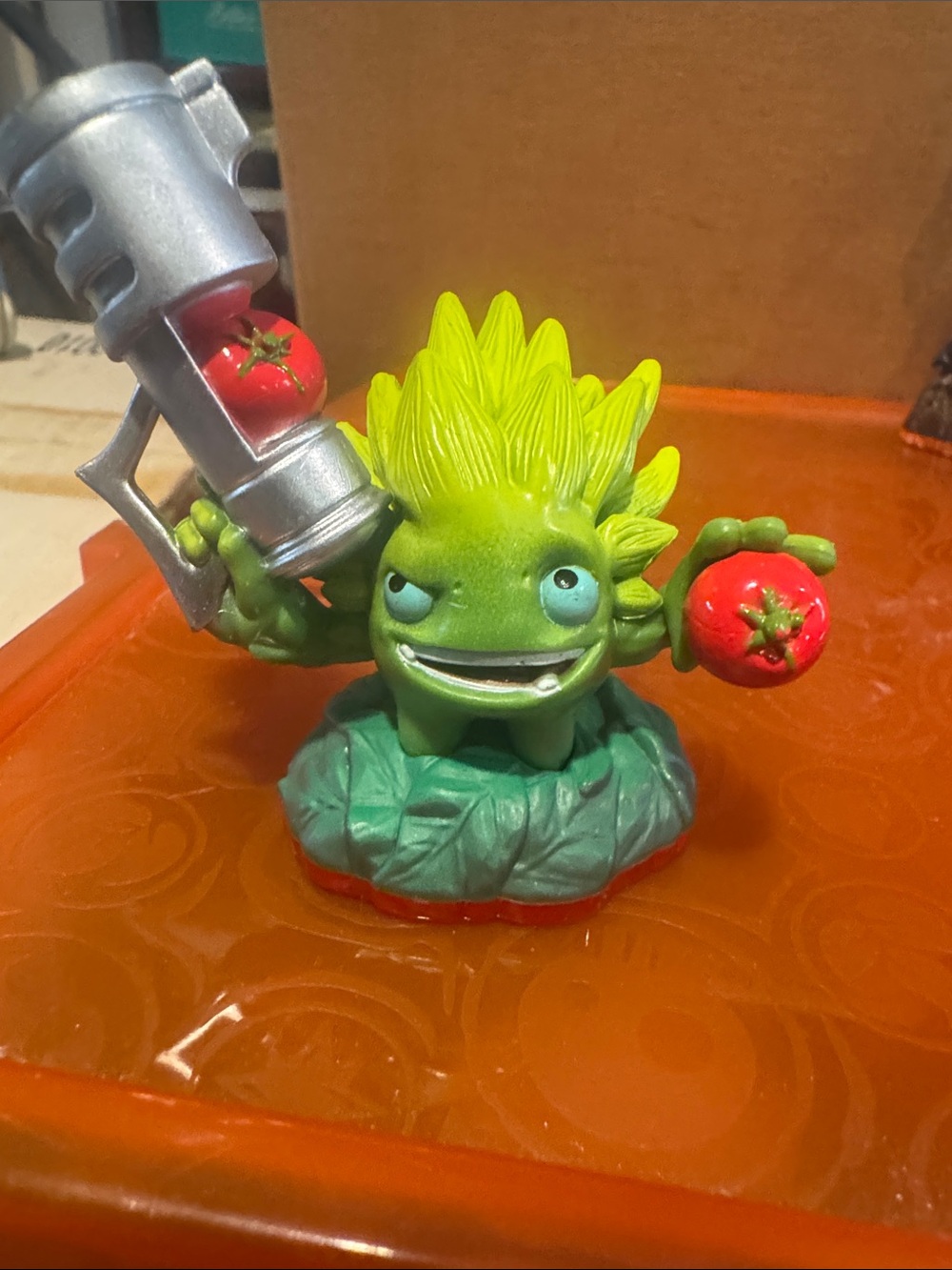 Green Spiky-Head Toy Figure with Tomato Accessories. Skylander